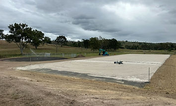 Installing base and riding layer sand on dressage arena at Bromelton, Scenic Rim QLD by Rippa Tippa Earthworks