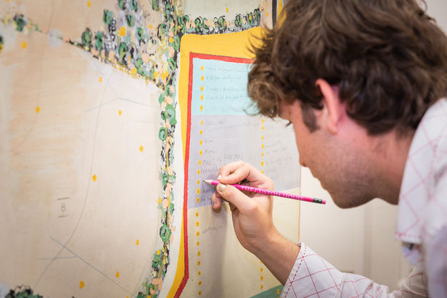 Detail of Marcus Vergette’s interactive Desire Map (2021) being added to by visitor to the exhibtion (Paper, canvas, pencil, gouache, inks)
