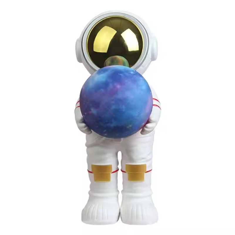 Miniatura: Parlante de astronauta con luz de galaxia
