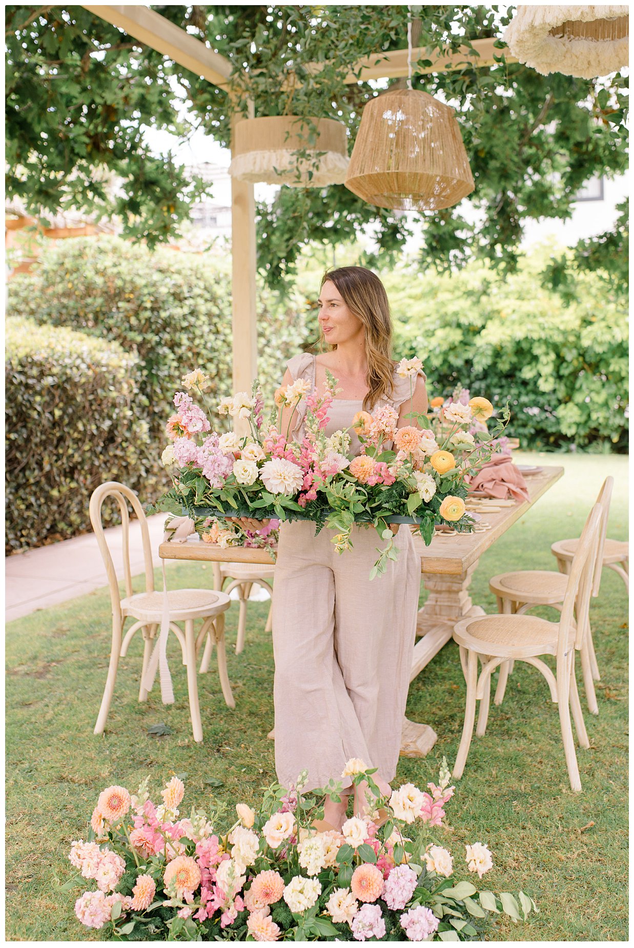 Ivory Stone Event Co carrying wedding day florals.