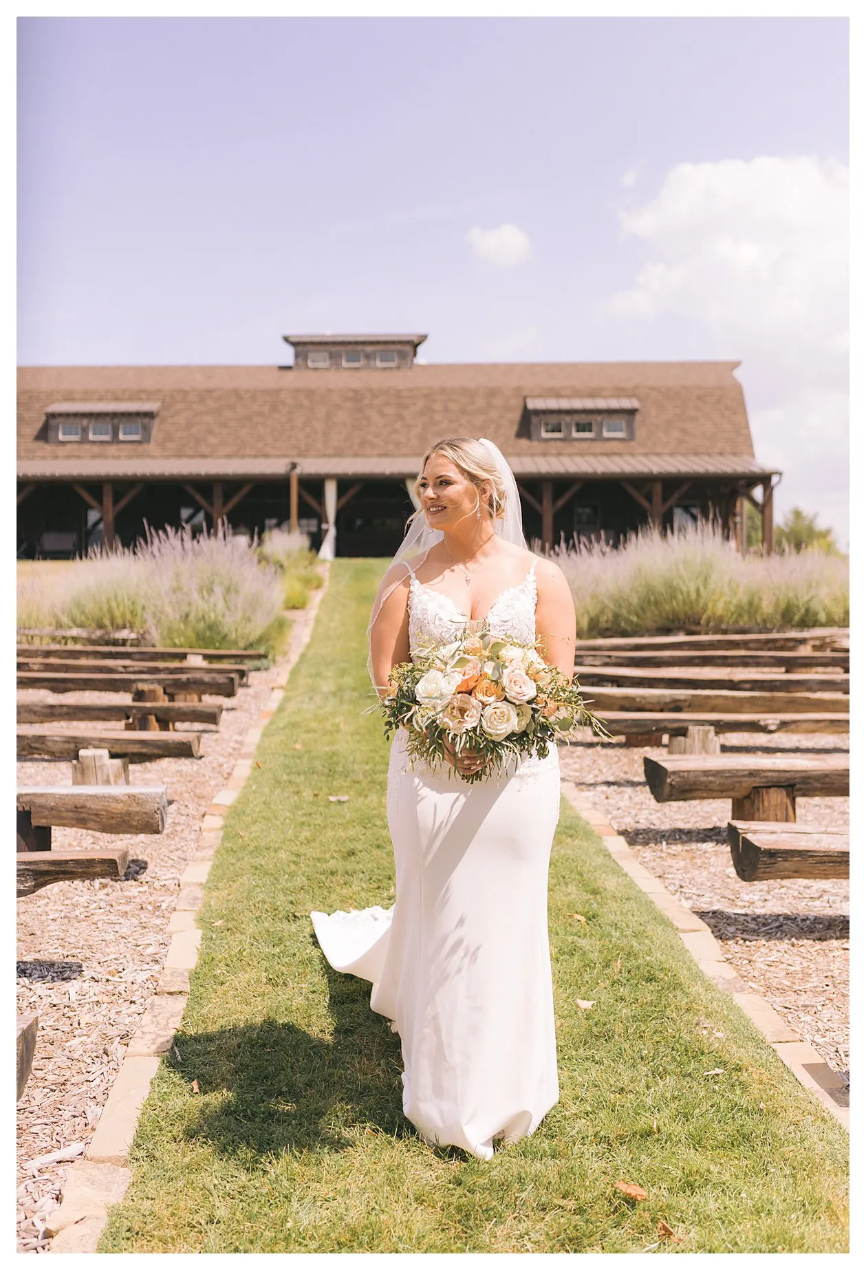 Bride walking down the aisle for a first look with her husband.