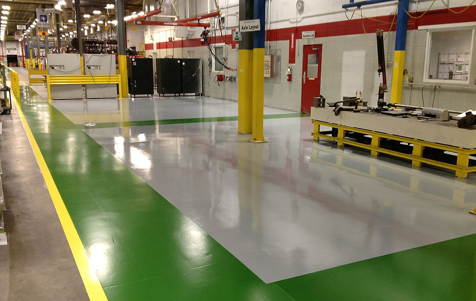 Green industrial epoxy floor coating installed in a manufacturing facility in Greenville SC