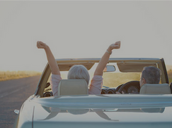 Couple driving off into the sunset on exit