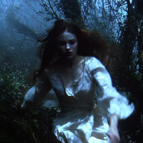 lindb102_a_young_woman_running_through_a_mossy_willowy_forres_9719d548-592e-4431-944e-f8acecb2ff66_3 (1)