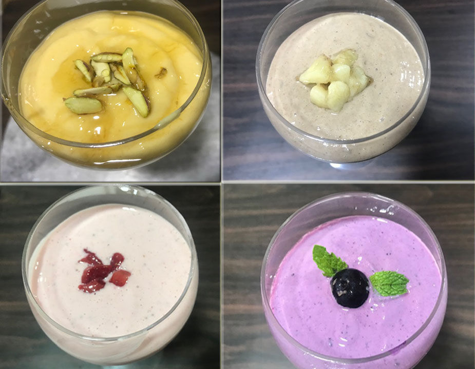 strawberry, blueberry, mango and banana flavored yogurt, prepared by mixing Greek Yogurt/hung curd with frozen respective fruits and some sweetener of your choice.