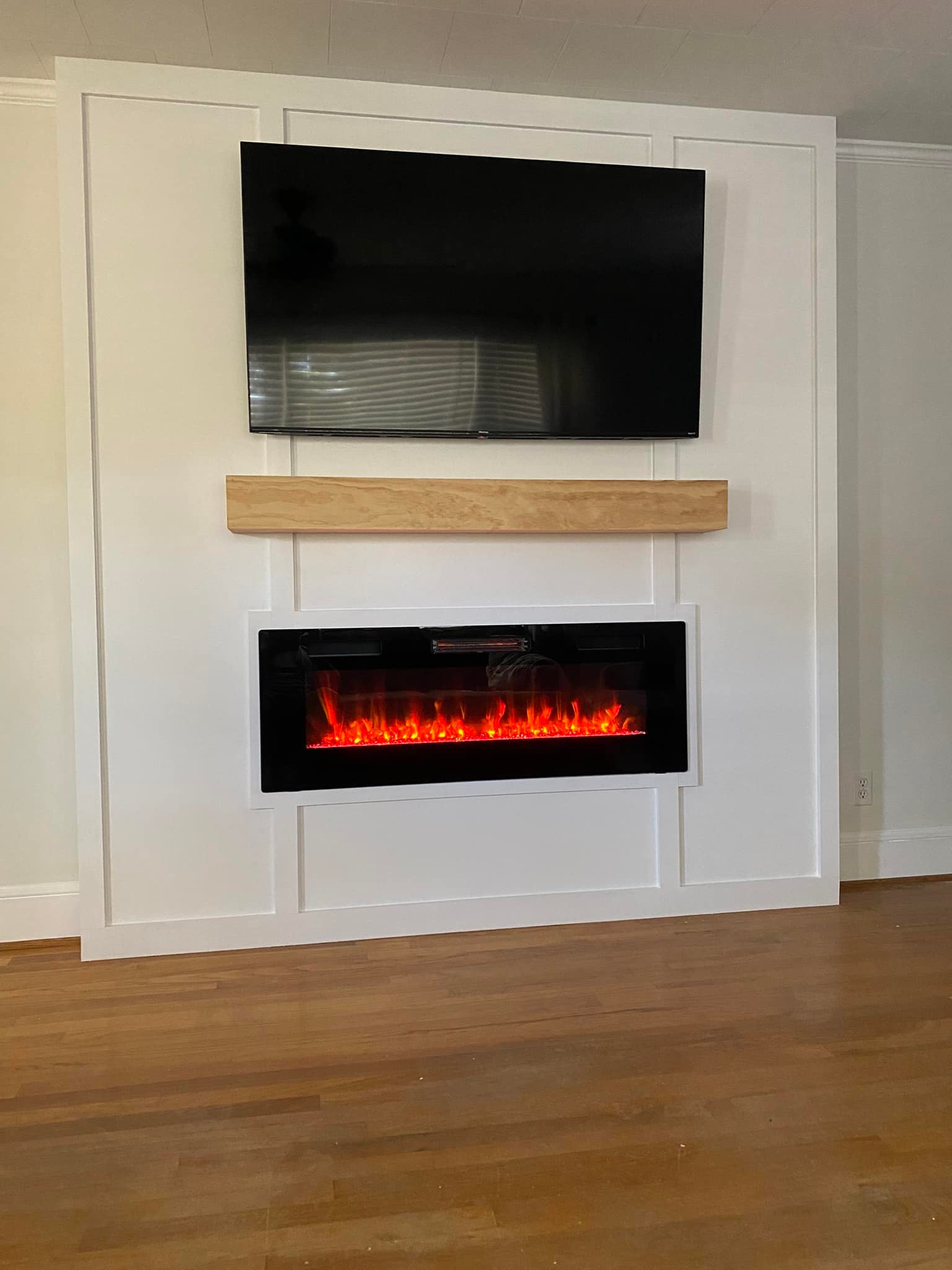 Finished fireplace feature wall from a Spot On interior renovation