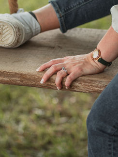 Close up image of a female model's engagement ring