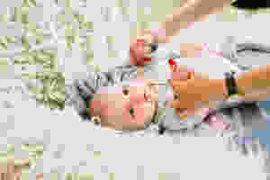 The benefits of baby massage, how to get baby to sleep better, cry less and feel less stressed
