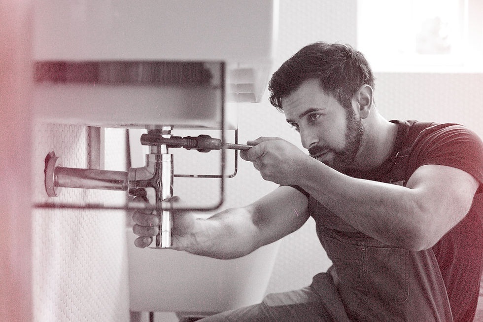 Plumber Fixing Pipe