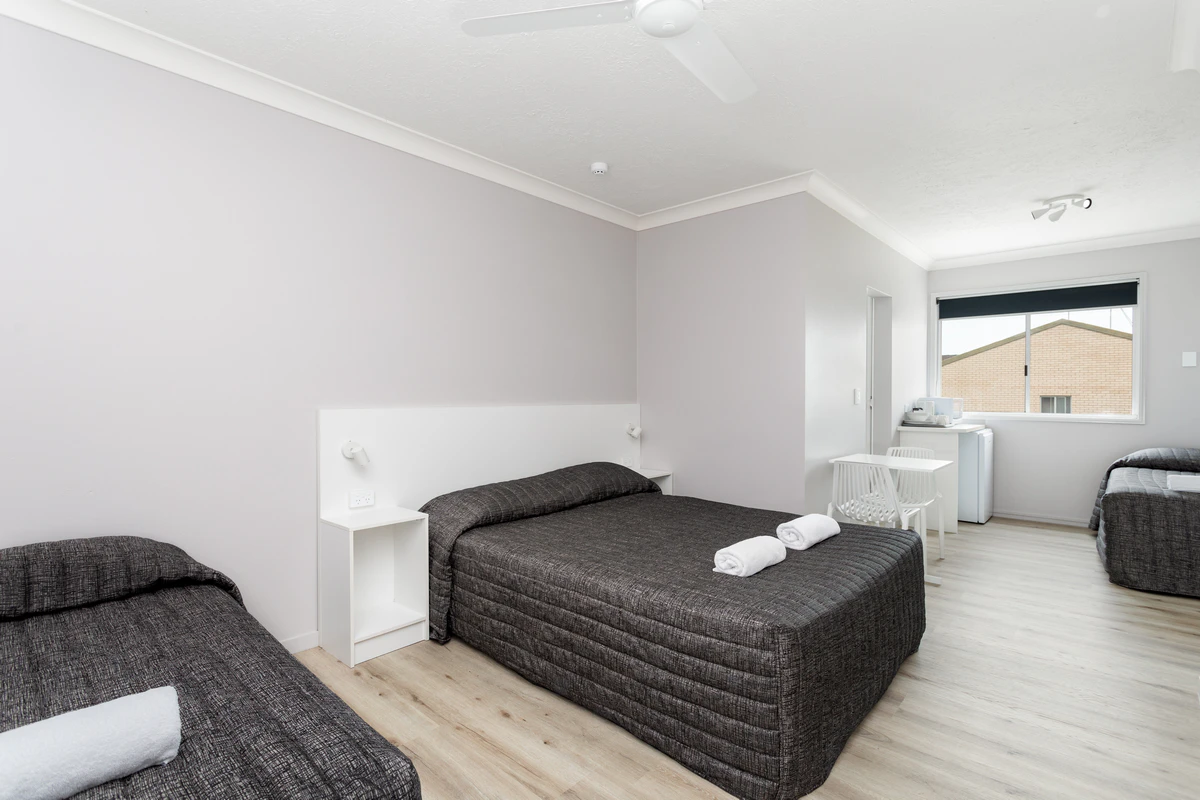 Quad room queen and two single beds — Burleigh Gold Coast Motel