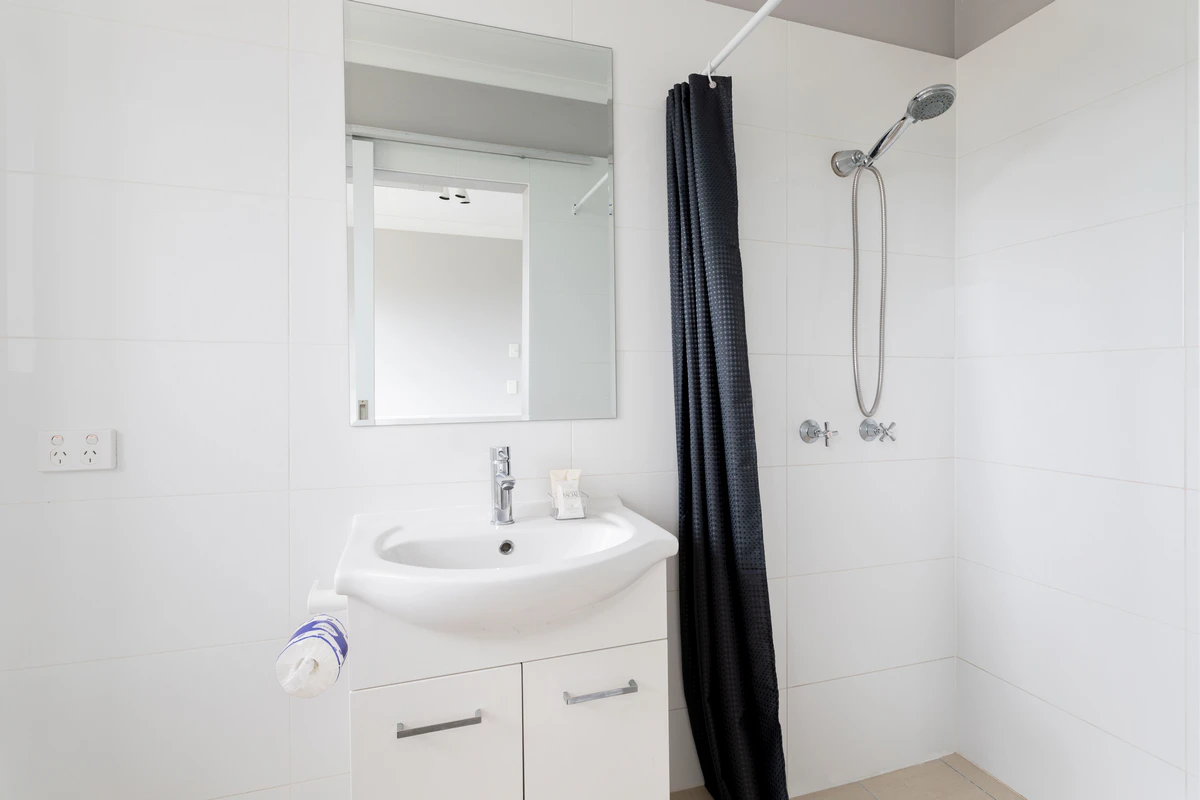 Private ensuite shower and bathroom — Burleigh Gold Coast Motel