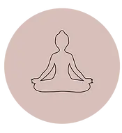 A woman in a lotus position on a pink background, embodying relaxation and mindfulness in her serene yoga practice