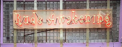 Rude Awakening coffee house sign