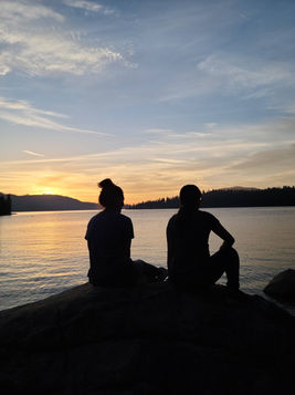 participants looking over the lake at sunset