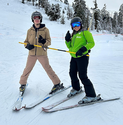 Hudson Cromwell skiing with instructor