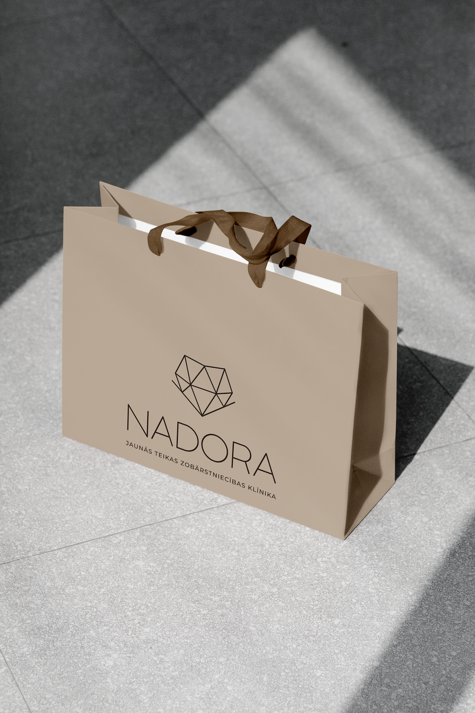 nadora shopping bag logo