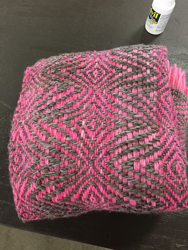 This shawl had handed Corriedale as a warp and natural Romney lamb as the weft.