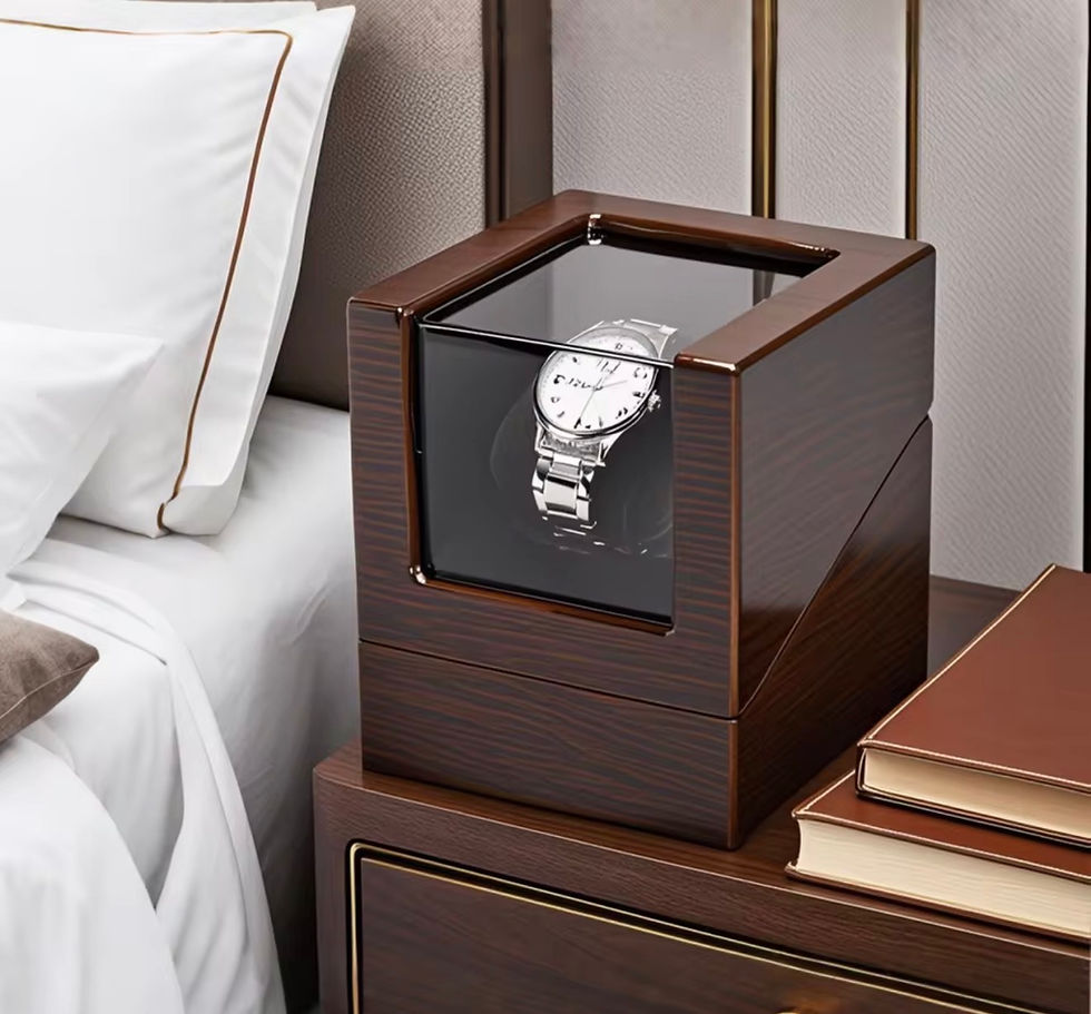 luxury single automatic watch winder with wooden case and glass display window on a nightstand next to the bed