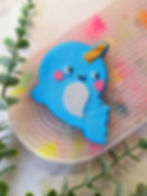 Large blue narwhal bath bomb for kids with gold horn and cute ocean animal design
