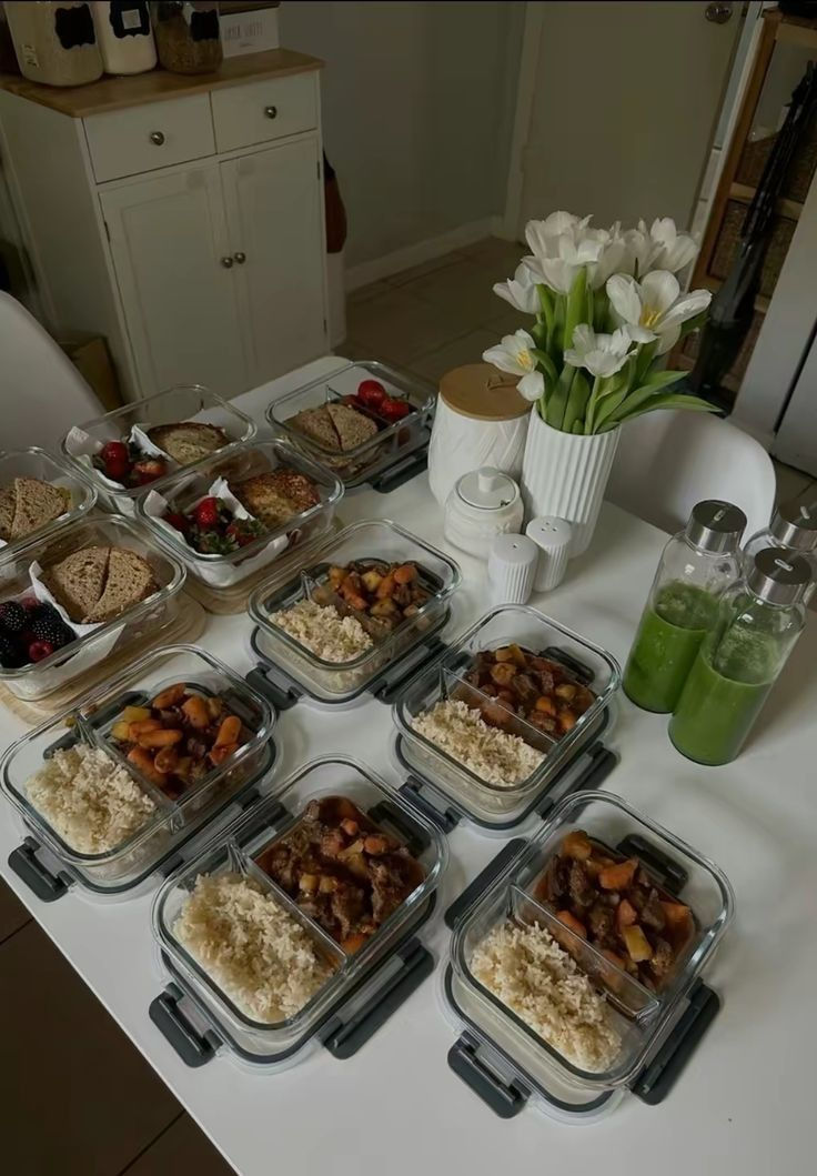 Close-up of meal prep containers with balanced portions of vegetables, grains, and protein