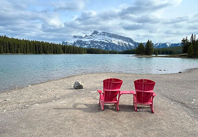 Nestled along the shoreline of Two Jack Lake, the bright red chairs have become a beloved symbol of Canada's national parks. Sit down, breathe in the fresh mountain air, and enjoy a picture-perfect Rocky Mountain moment.
