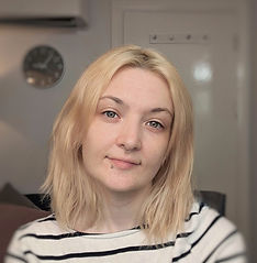 A headshot photo of Molly