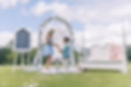Auburn, AL wedding proposal wedding arch engagement photos of engaged couple