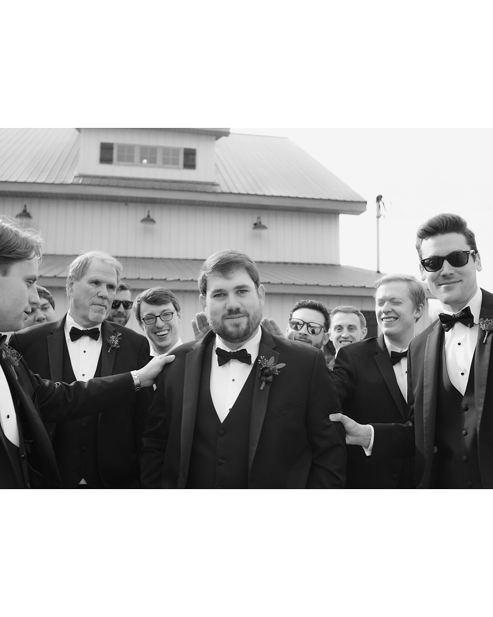 Pike Road, AL groom and groomsmen outside barn wedding venue