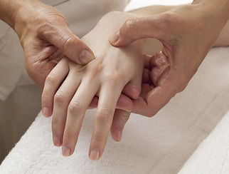Physiotherapist perform hand therapy treatment for patient