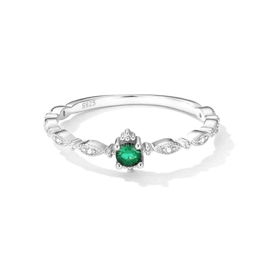 Miniatura: Anillo zirconia verde acostado