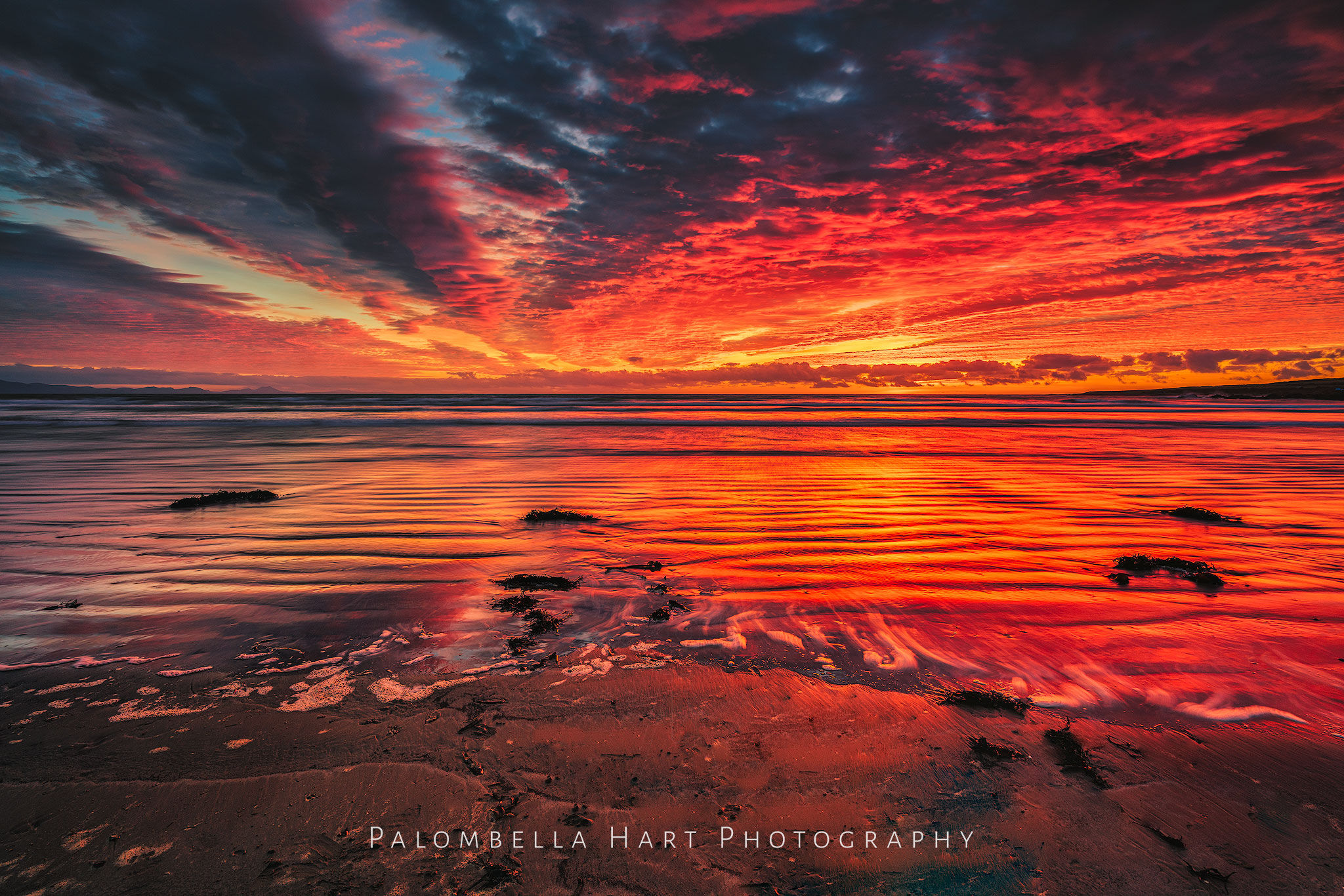 Red Sunset Over Aberffraw Beach photograph