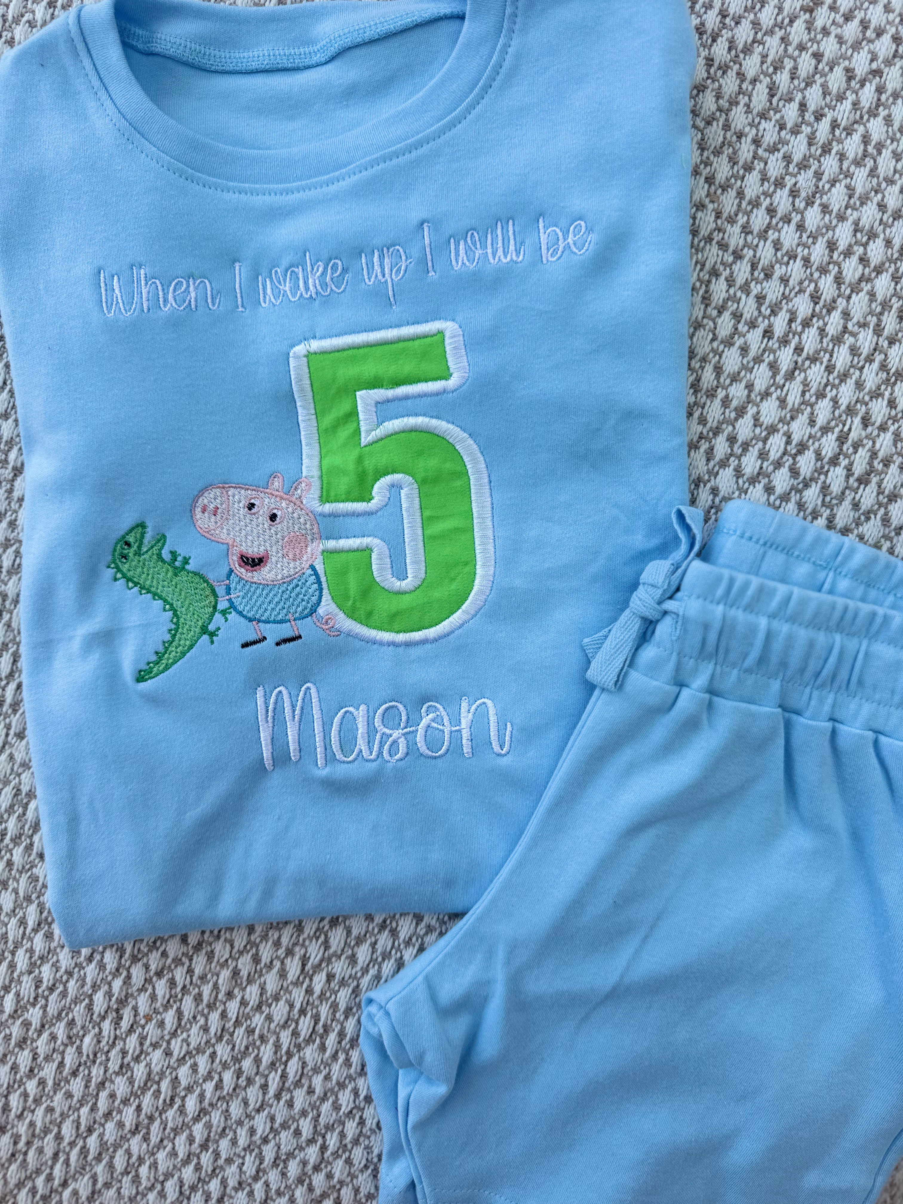 George and dinosaur pyjamas