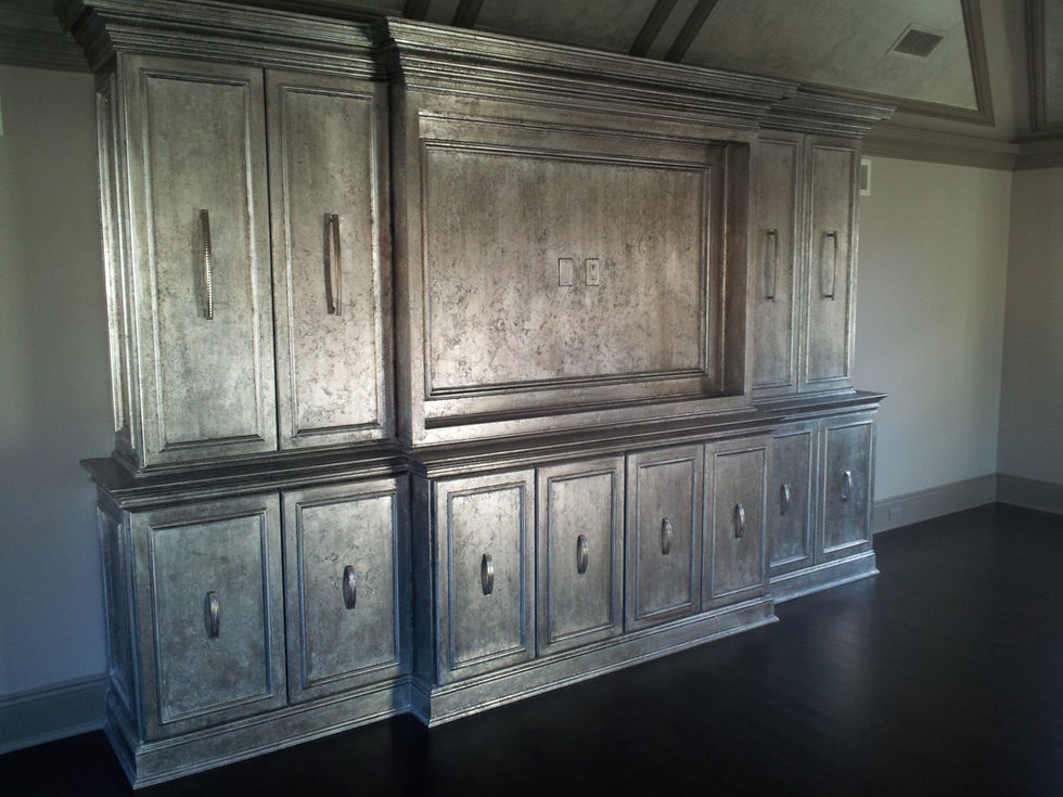 Distressed and aged gilded silverleaf built-in cabinets