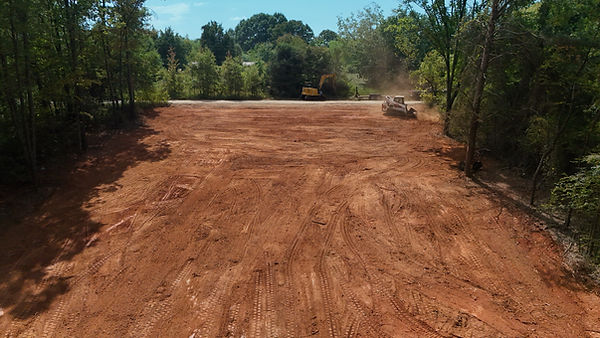Cleared lot that is graded by a skidsteer everything is hauled out in China Grove