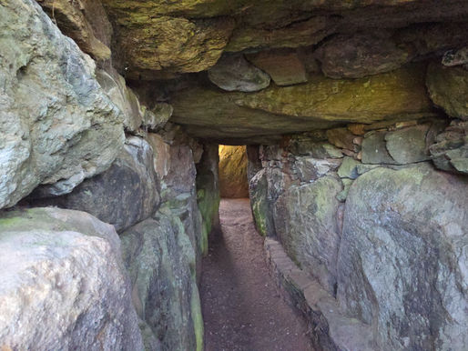 Blueschist stones inside the chamber at Neolithic chambered tomb Bryn Celli Ddu, Anglesey, Wales, UK.
