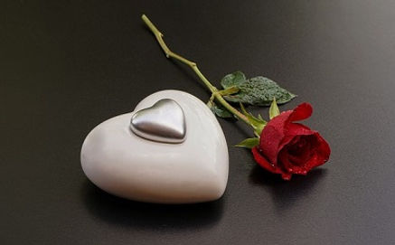 stone-heart-with-red-rose.jpg