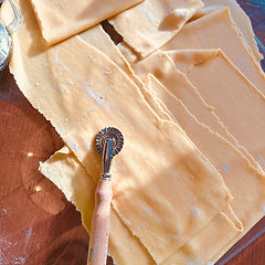 Freshly rolled sheets of pasta dough