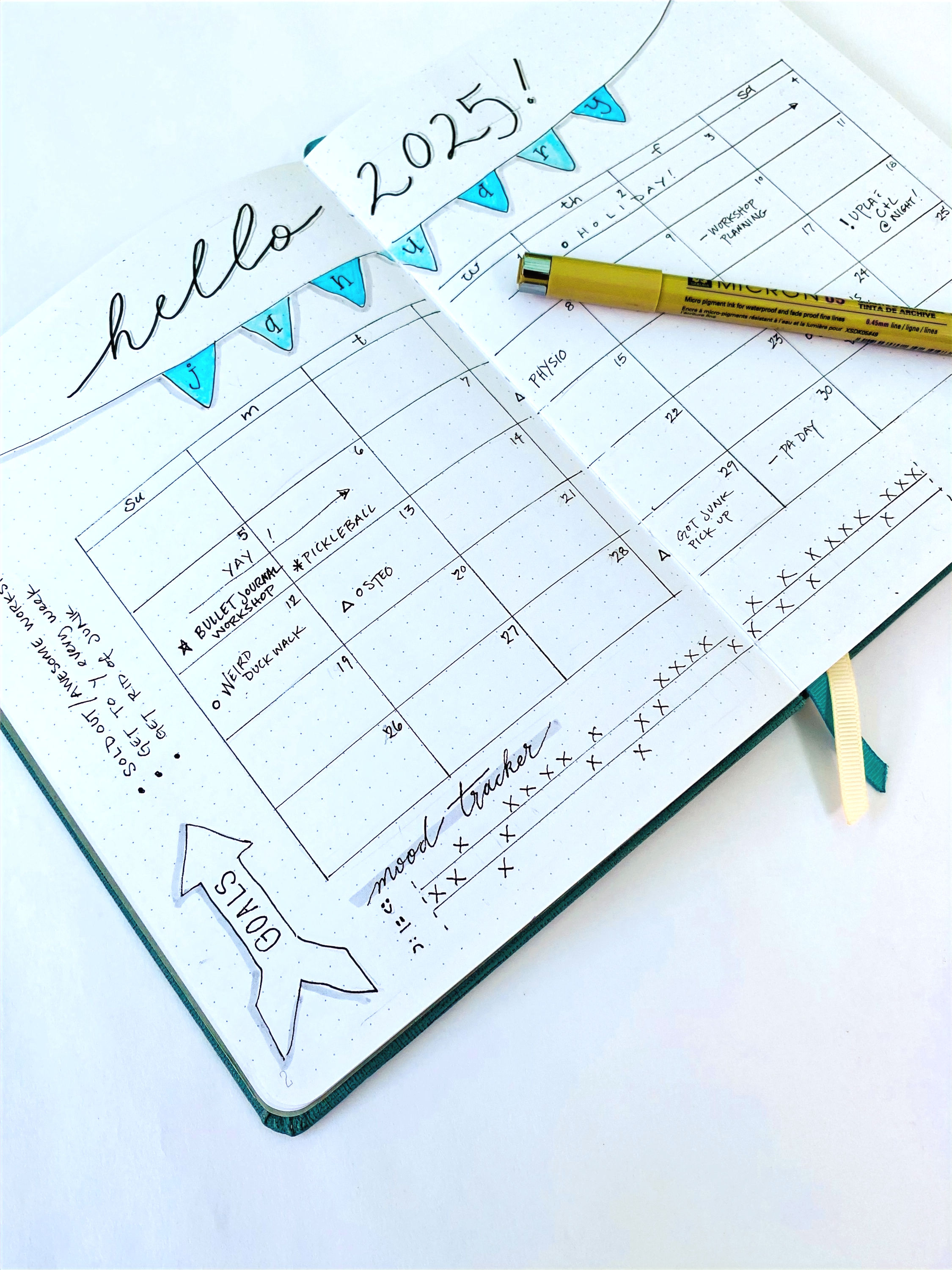 Bullet journal with pen