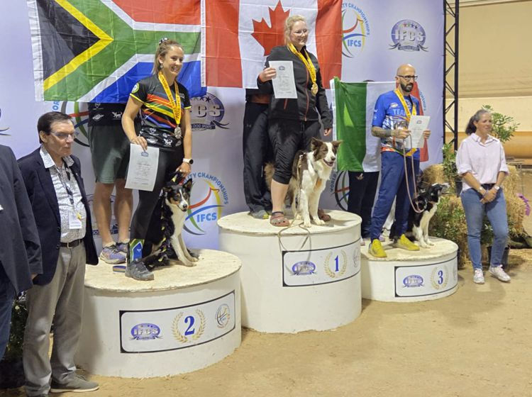 Gold Medalist Kassandra Harink & Blaze (CAN), with Silver Medalist Sonelle van Wyk & Ace (RSA), and Bronze Medalist Francesco Zaccarini & Shepworld (ITA)