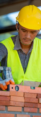 bricklayer-laying-bricks-make-wall-construction-site_edited_edited.jpg