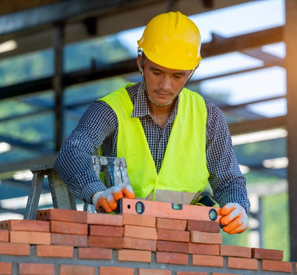 bricklayer-laying-bricks-make-wall-construction-site_edited_edited.jpg