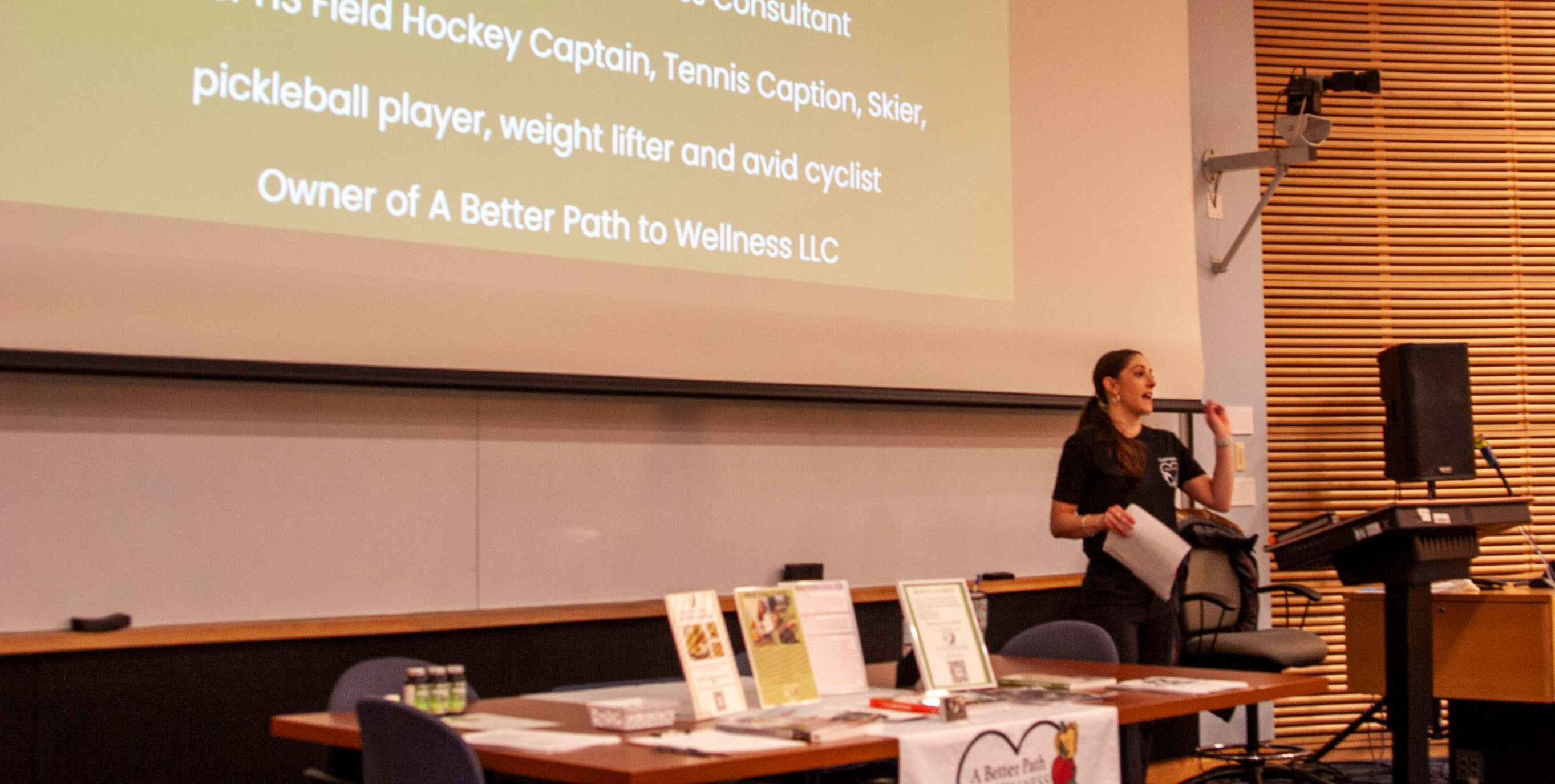 Kellie Hamilton presenting a wellness workshop