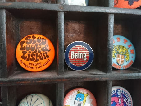 Thanks Cameron, for sharing a pic of your badge collection. Eye spot a Being target enamel badge!