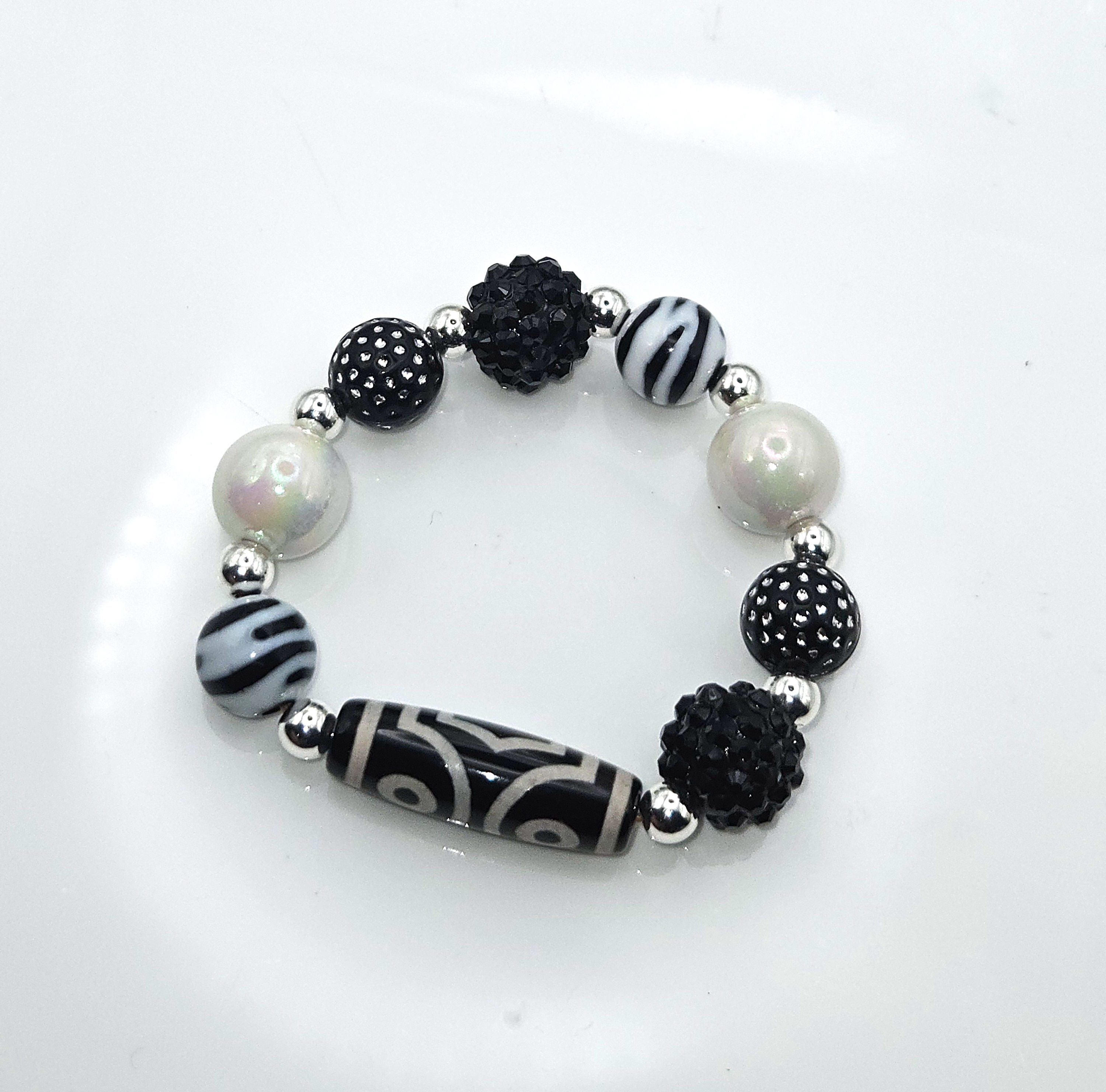 Wooden Bracelet with stretch banding. one size fits most