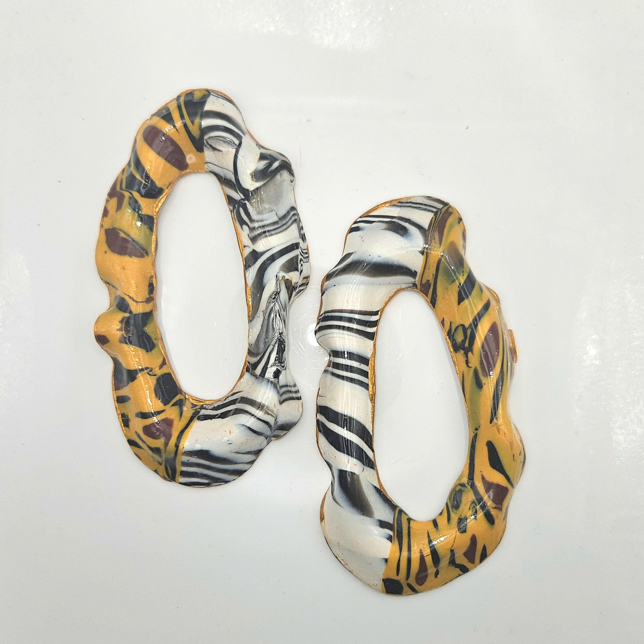 Halo Flow--Abstract  hooped  Statement Earrings with Animals prints and stripes