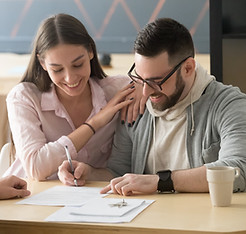 excited-millennial-couple-signing-purchase-agreement-buying-first-home-together-husband-pu