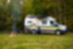 campsite-with-roaring-campfire-and-man-and-woman-having-a-good-time-camping-with-glamp-mob