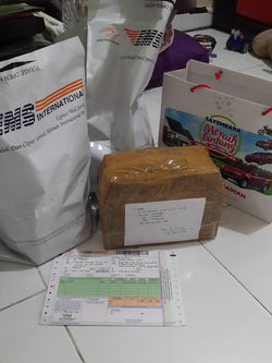 sebagian bukti kirim paket toko aura