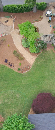 Aerial view of completed landscape design with walkways and planting beds in Atlanta GA
