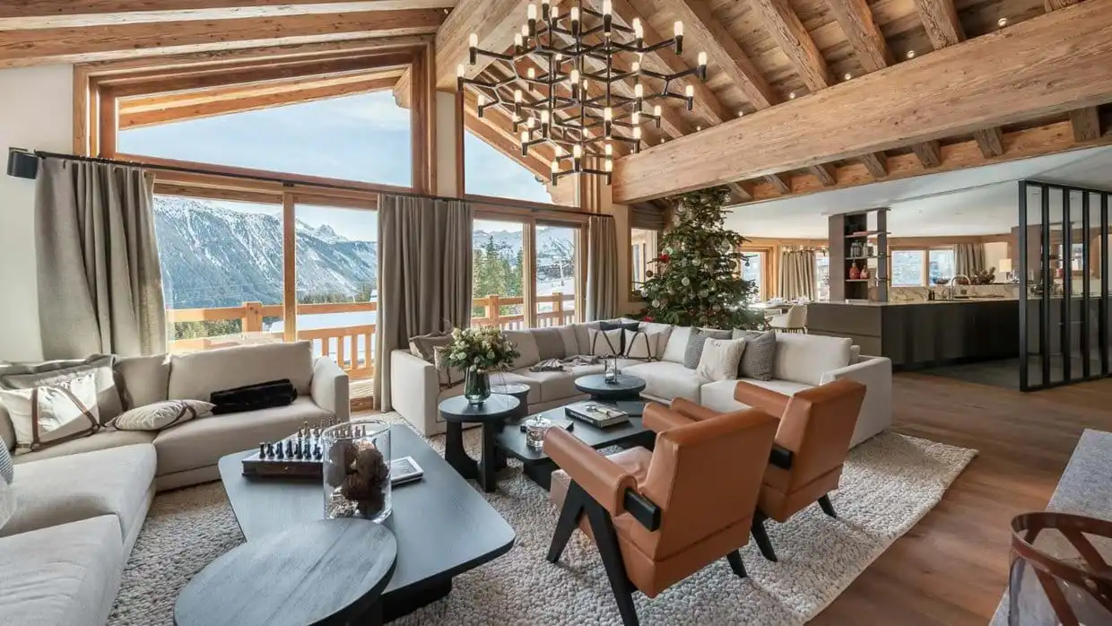 A grand living room with a christmas tree